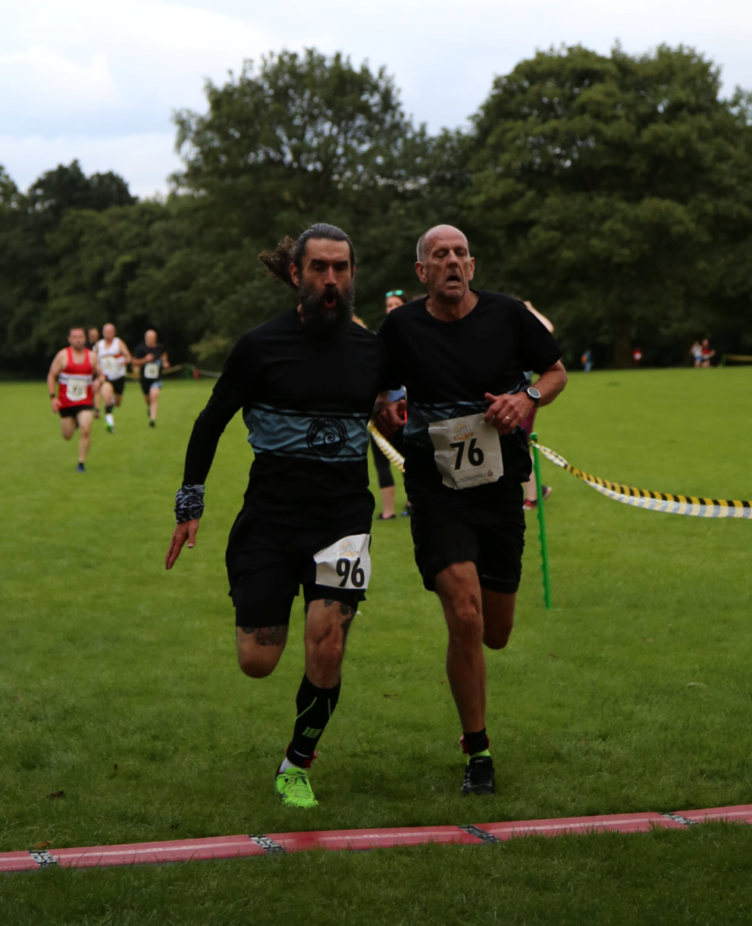 Ramsbottom Summer Mile Ali Crossing the finish line